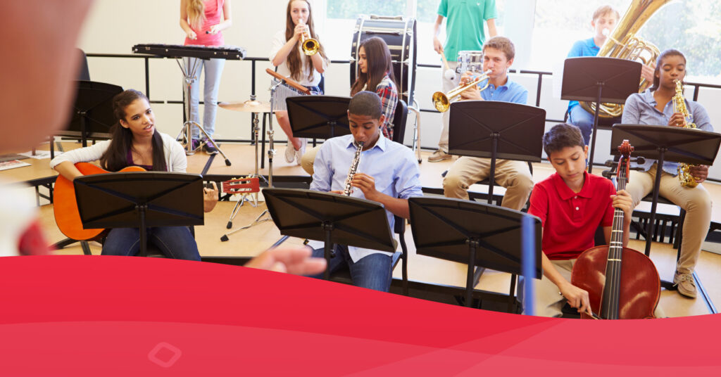 Classroom of children playing instruments.